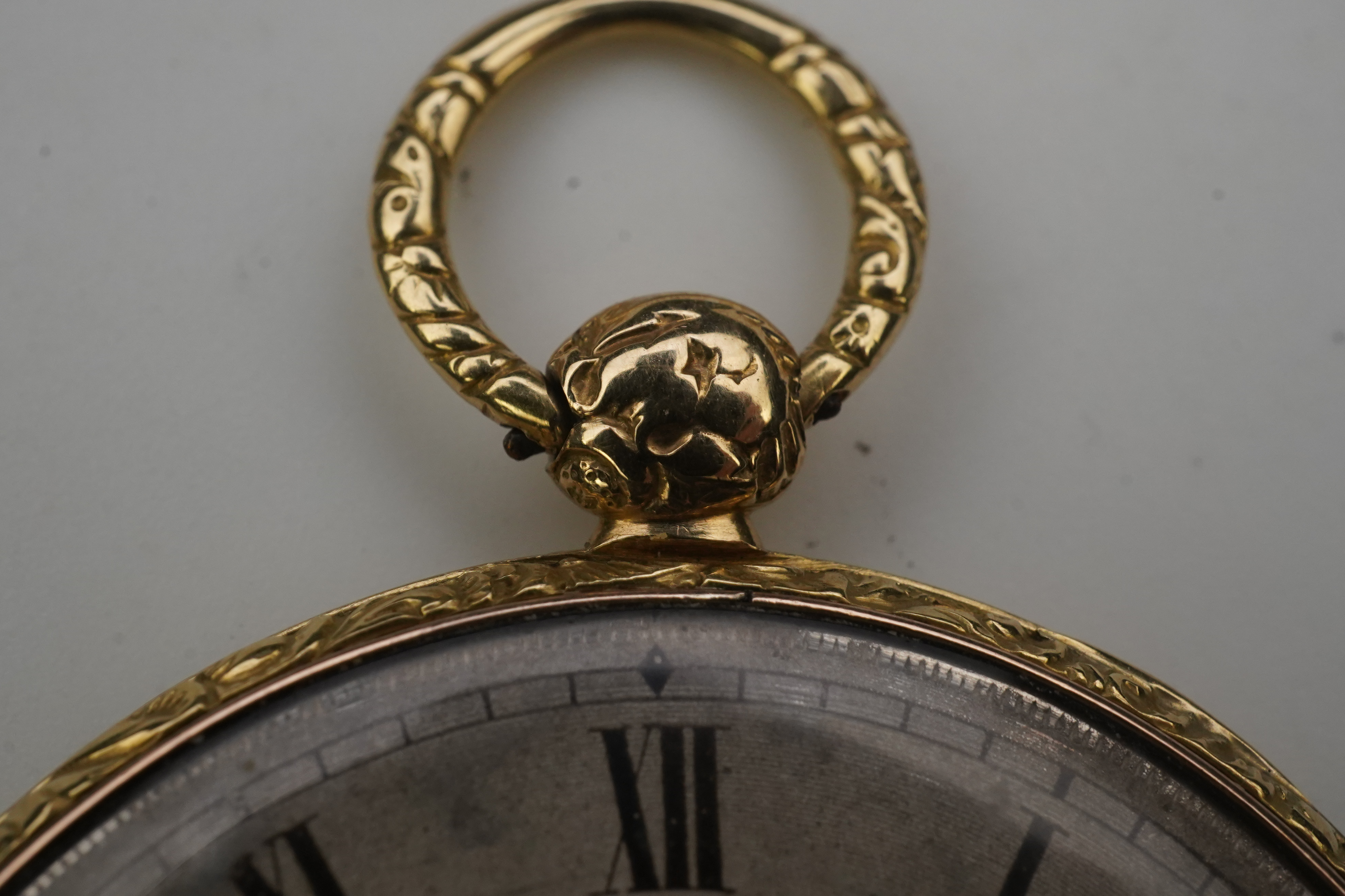 A lady's 19th century Swiss 18ct gold open faced key wind cylinder dress pocket watch